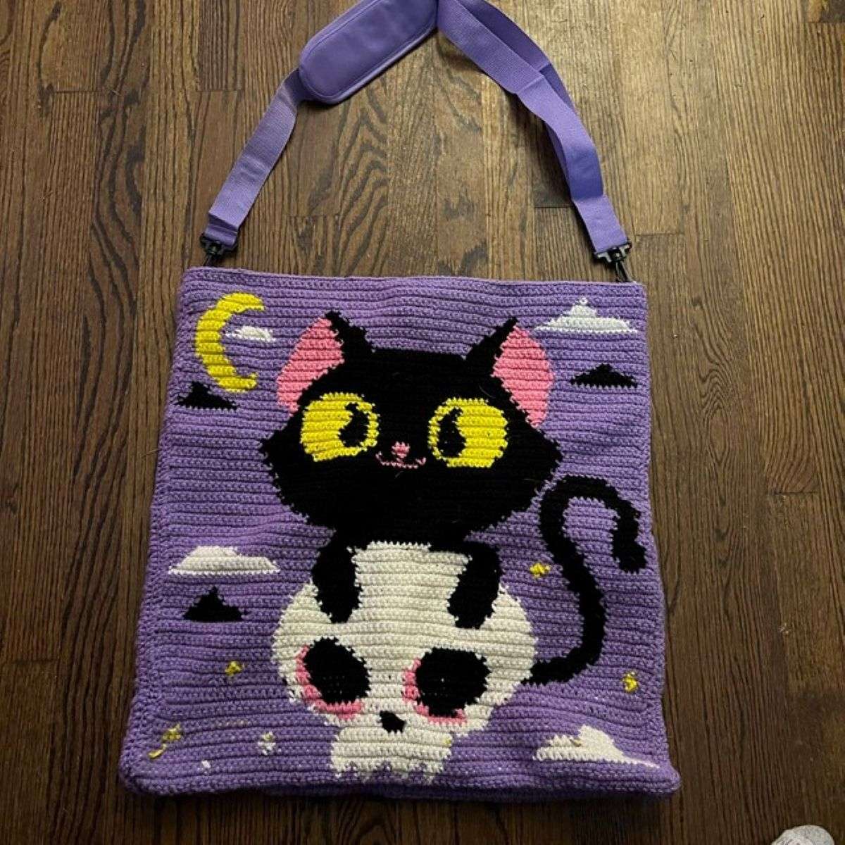Customer-made Halloween black cat crochet bag with purple background moon skull and stars