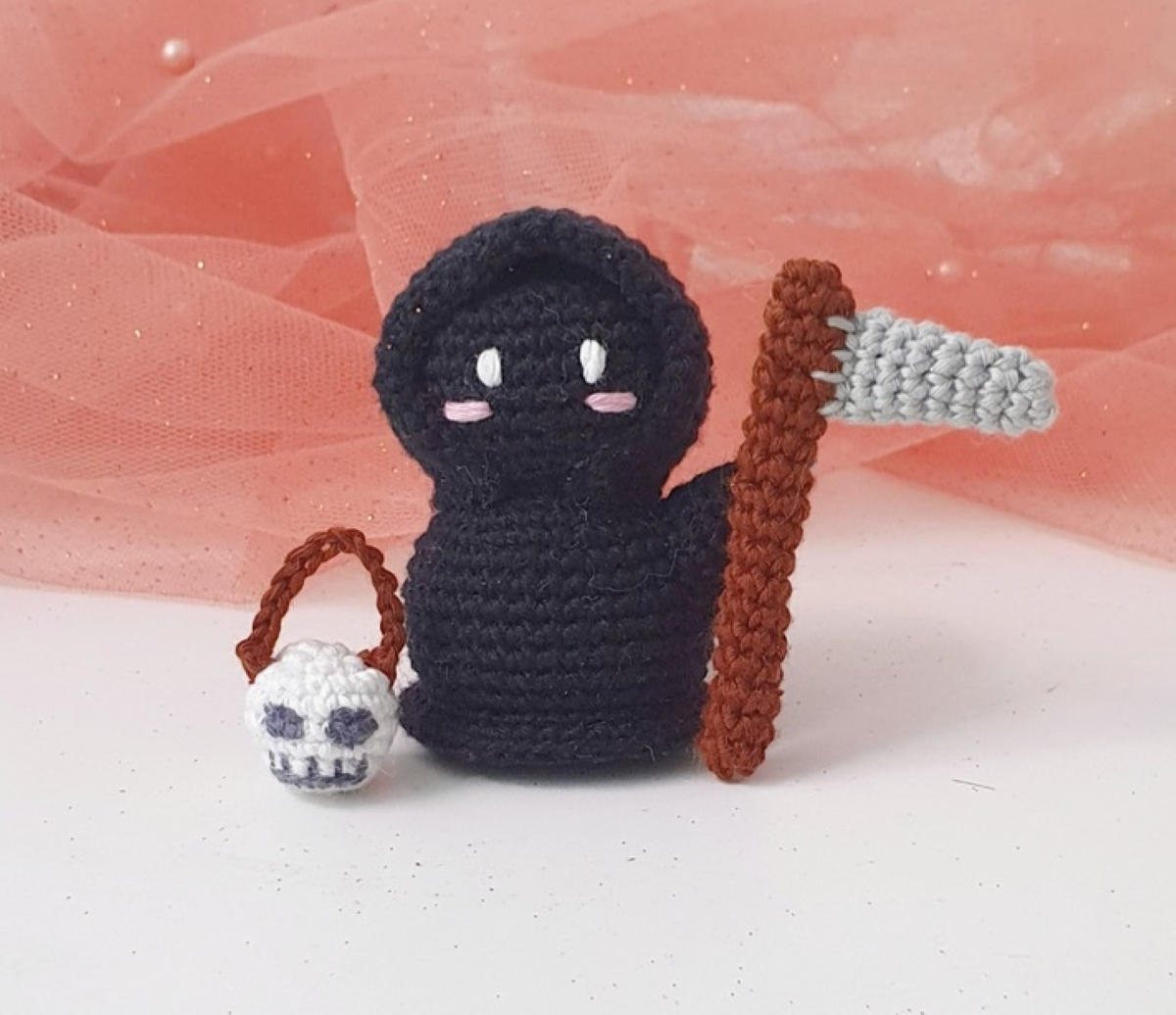 Discover 13 free Grim Reaper crochet patterns, including a spooky blanket, cute amigurumi, mini Reapers, plushies and Halloween keychain projects.